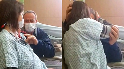 Pai se emociona ao ouvir coração de filha depois de transplante.